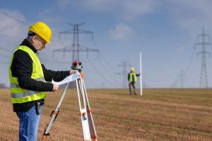 Land Surveyor working in a field