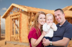 family getting land survey before new build