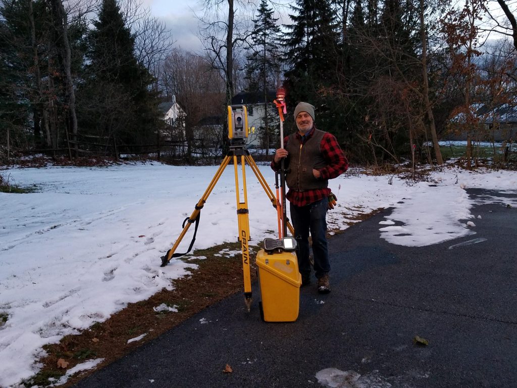 David Spurr surveying property