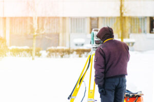 Land Surveyor in the Winter